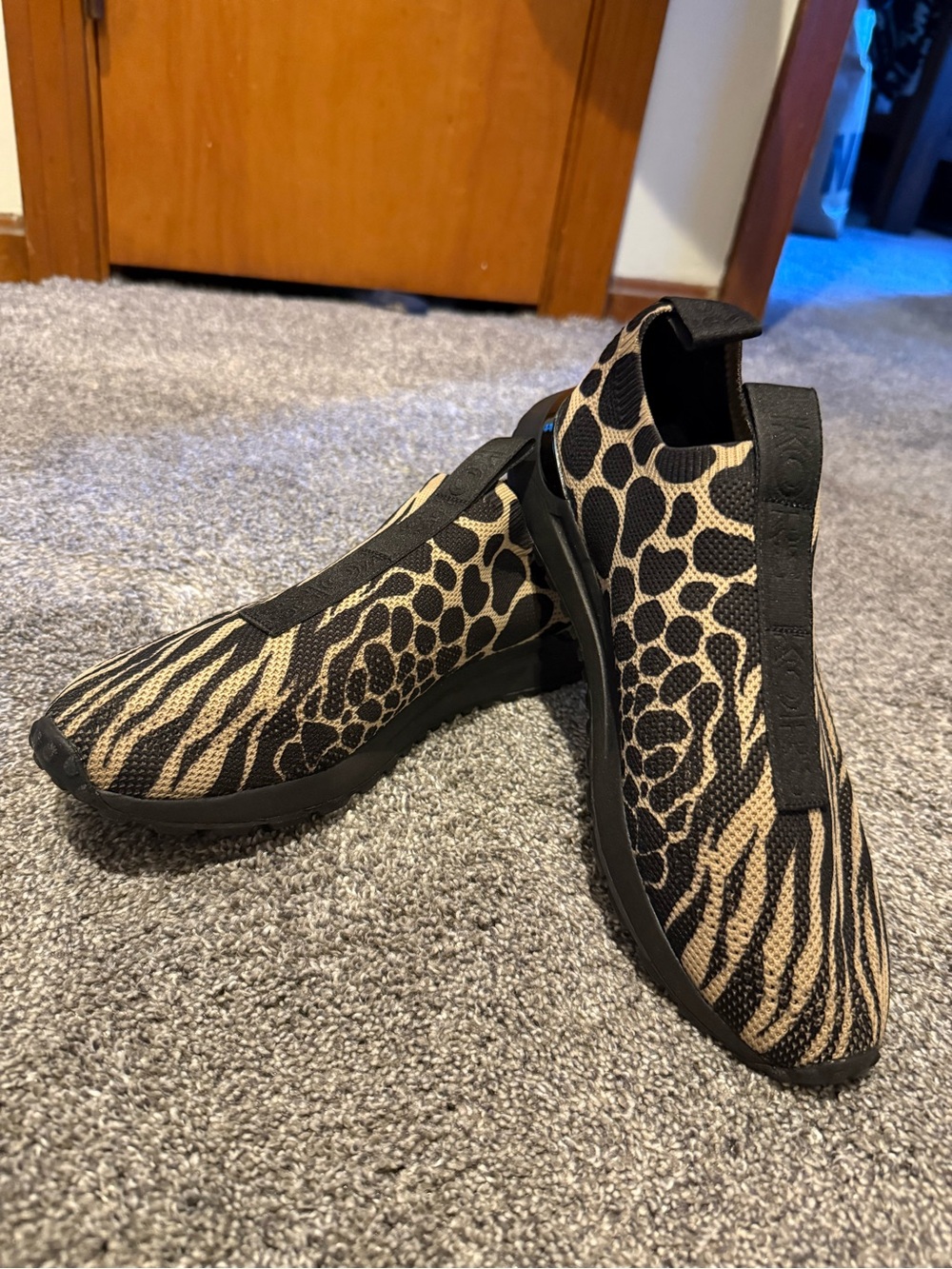 Michael Kors Women Slip-On Sneakers in Black and Tan Animal Print